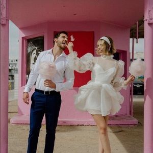 Short wedding dress, long puffy sleeves, high neck, theatrical bridal dress